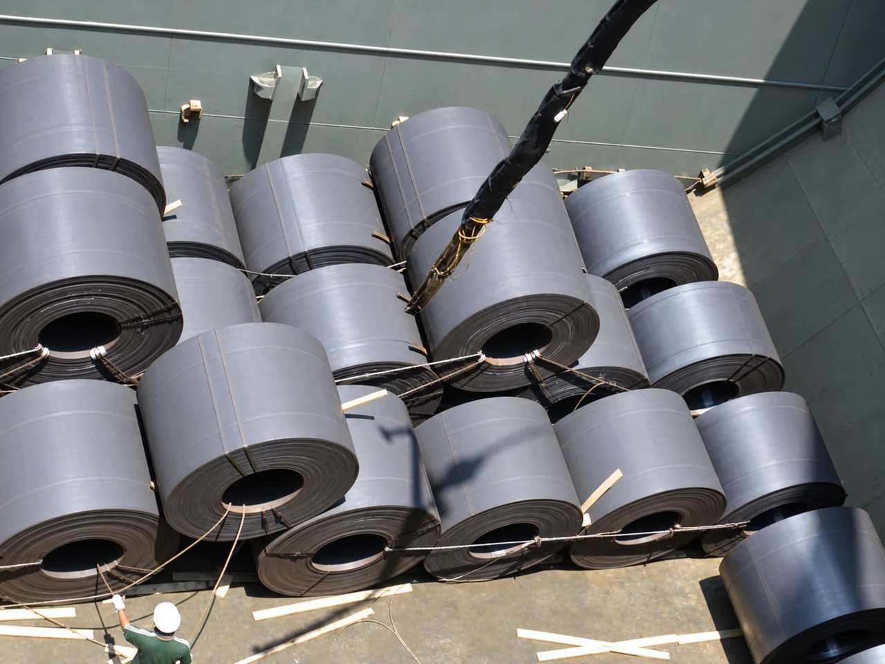 Steel coils arranged in the cargo hold for ocean transport.